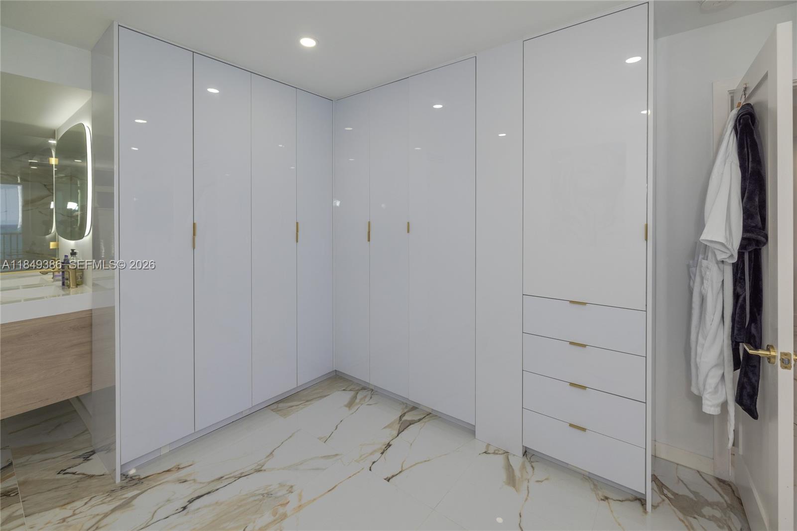 400 North Surf Road, Unit 1002 Hollywood, FL 33019 - Photo 20 of 43 a view of a hallway with closet