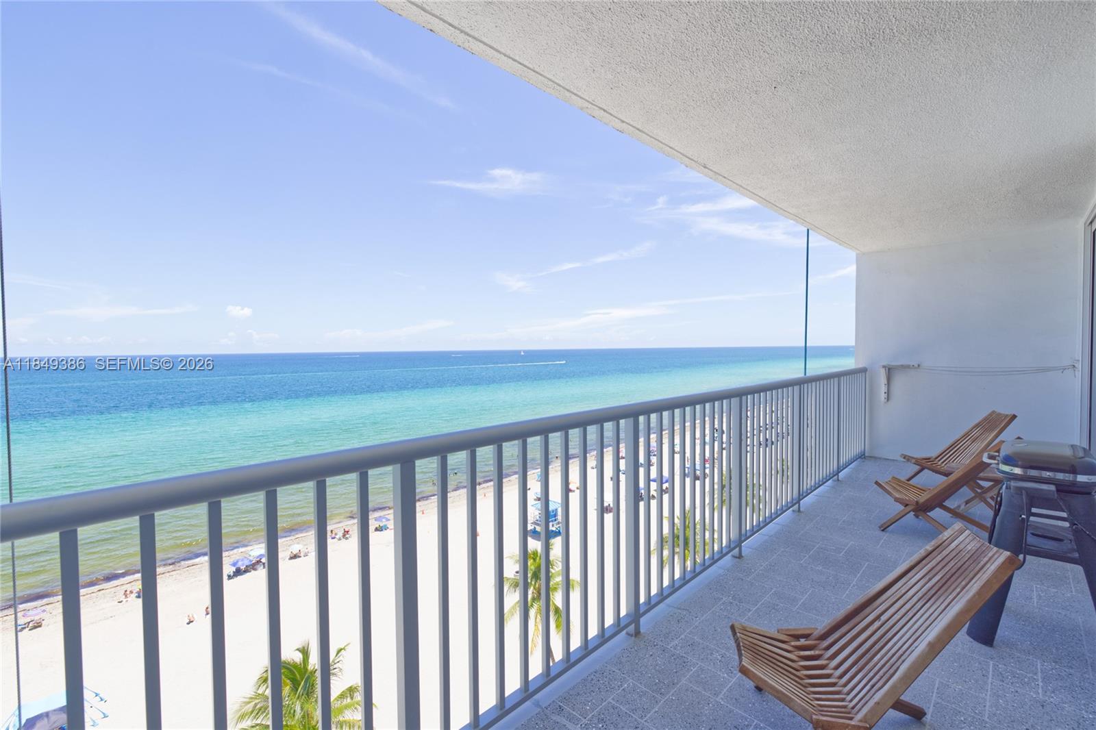 400 North Surf Road, Unit 1002 Hollywood, FL 33019 - Photo 24 of 43 a balcony with chairs