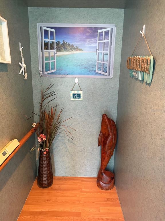 3338 Fernleaf Drive Hernando Beach, FL 34607 - Photo 35 of 69 a vase of flowers sitting on a table