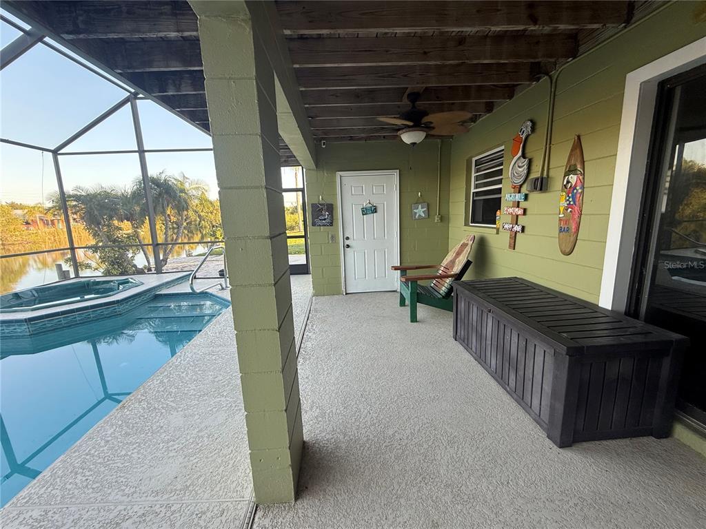 3338 Fernleaf Drive Hernando Beach, FL 34607 - Photo 50 of 69 a view of a porch with chairs