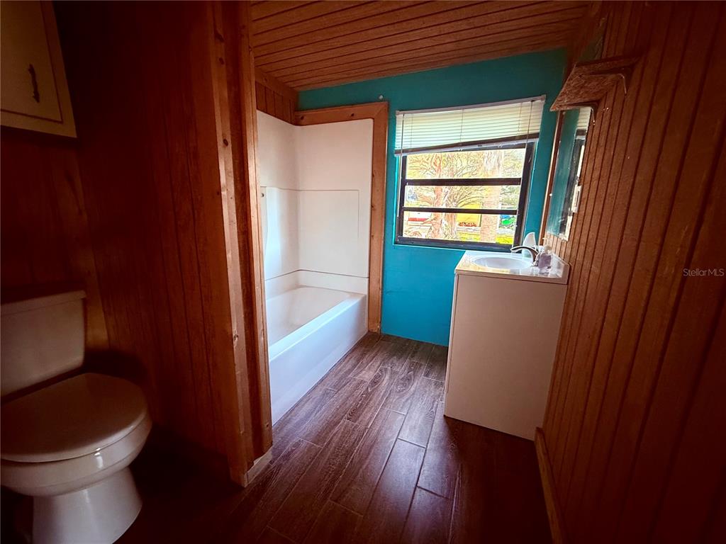 3338 Fernleaf Drive Hernando Beach, FL 34607 - Photo 61 of 69 a bathroom with a toilet and a shower