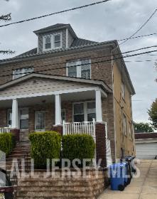 36 Paul Street, Unit 38 Fords, NJ 08863 - Photo 1 of 3 a front view of a house with stairs