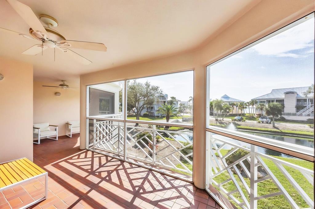 11000 Placida Road, Unit 2202 Placida, FL 33946 - Photo 12 of 58 a view of a living room and a balcony