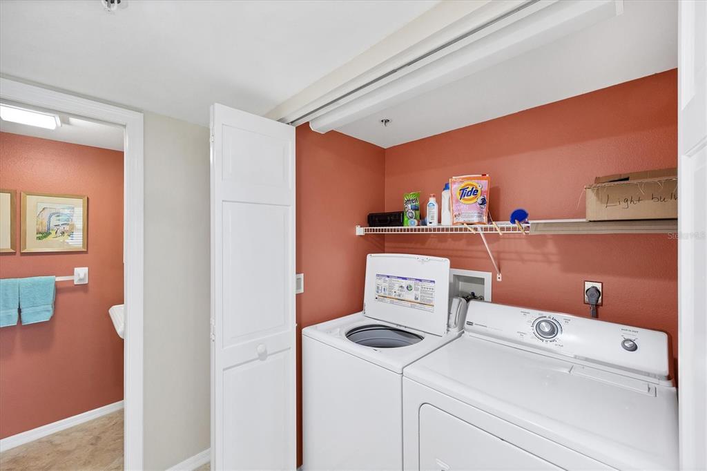 11000 Placida Road, Unit 2202 Placida, FL 33946 - Photo 26 of 58 a utility room with dryer and washer