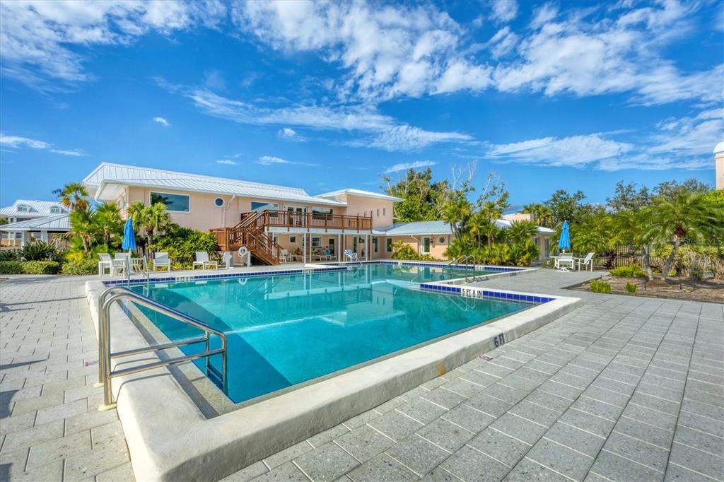 11000 Placida Road, Unit 2202 Placida, FL 33946 - Photo 30 of 58 a view of a swimming pool with a patio