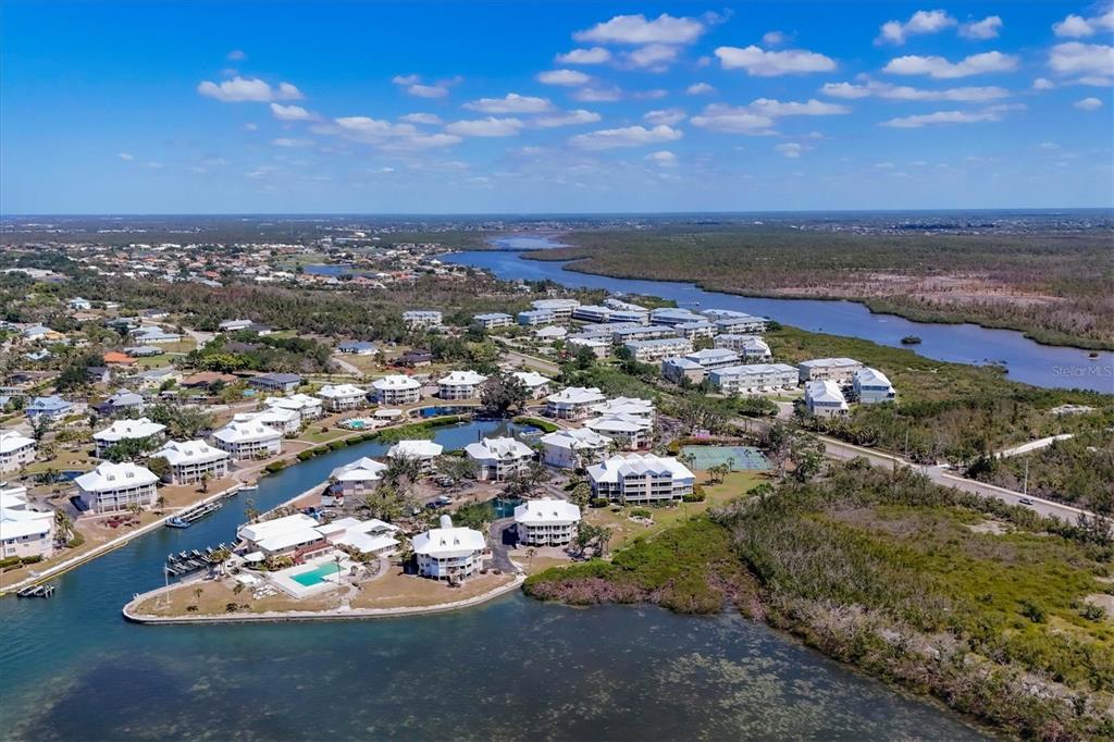 11000 Placida Road, Unit 2202 Placida, FL 33946 - Photo 55 of 58 an aerial view of a house with a yard