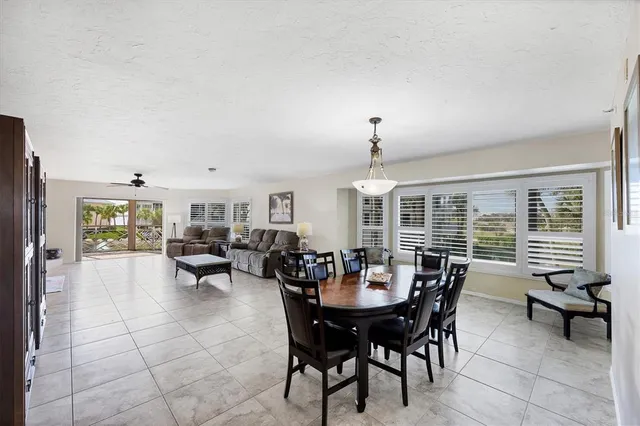 a view of a living room and a balcony
