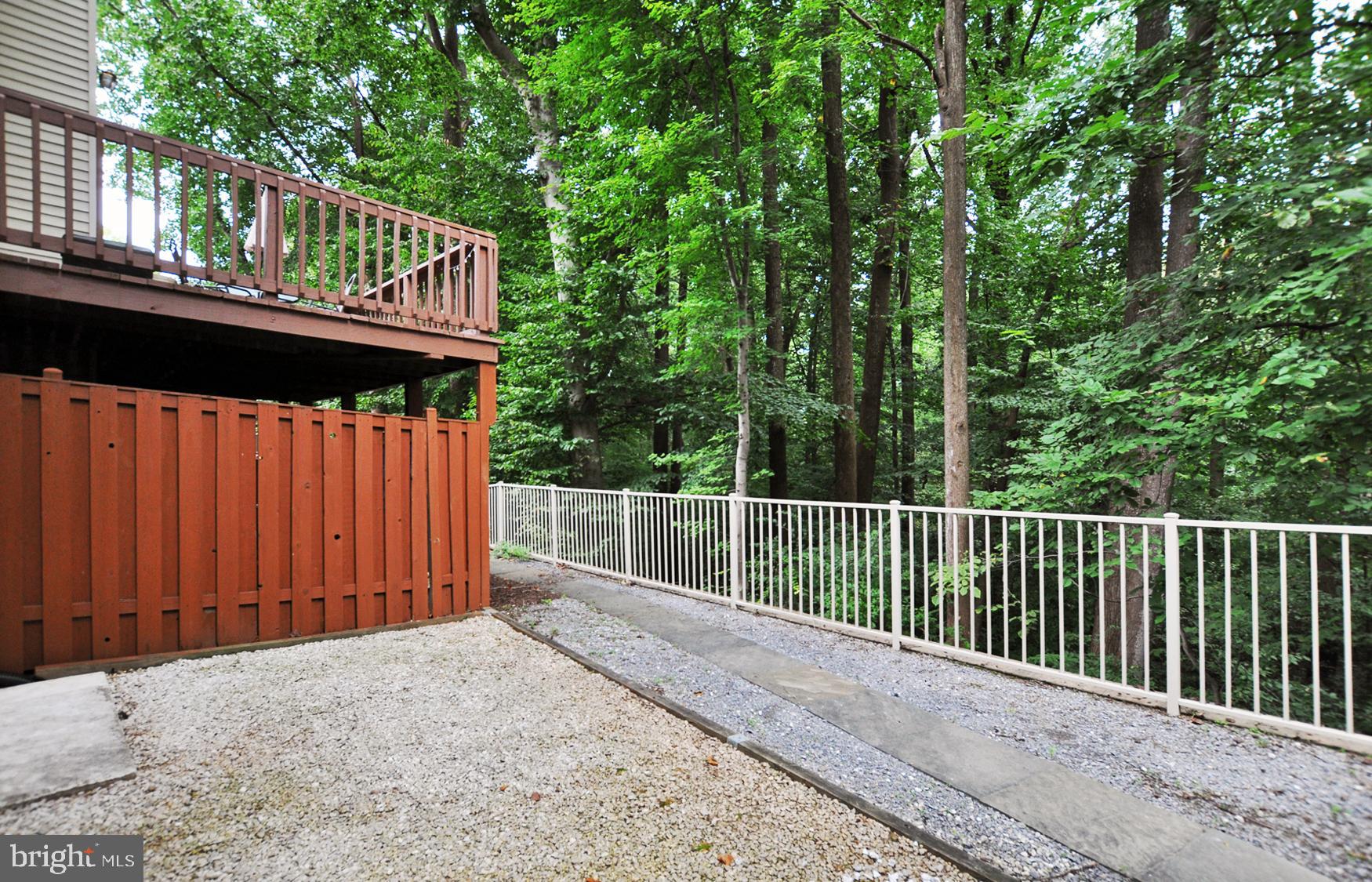 5447 Grove Ridge Way, Unit 115 Rockville, MD 20852 - Photo 19 of 36 Nature path at rear