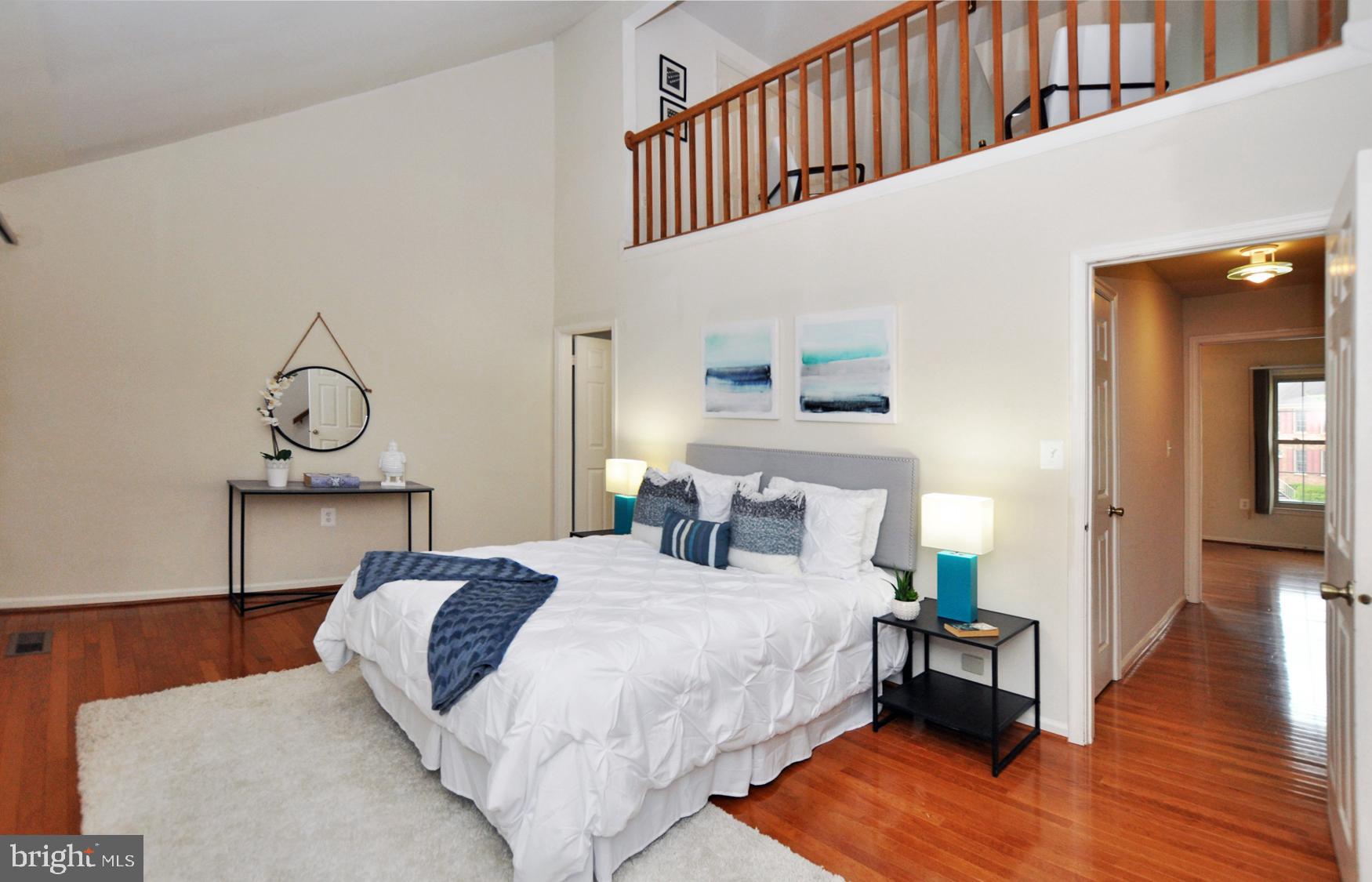 5447 Grove Ridge Way, Unit 115 Rockville, MD 20852 - Photo 20 of 36 Primary Bedroom with vaulted ceiling