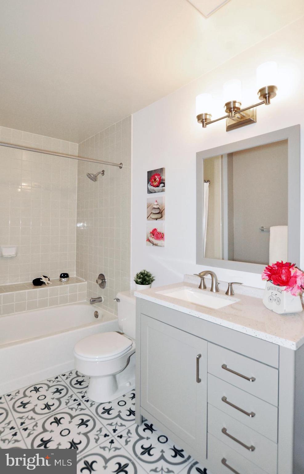 5447 Grove Ridge Way, Unit 115 Rockville, MD 20852 - Photo 29 of 36 Updated Bath #2 - en-suite with Bedroom #2