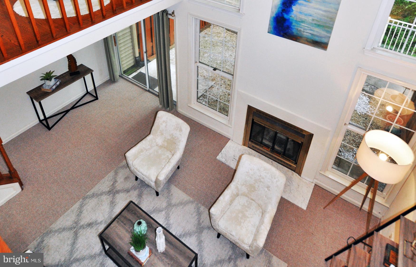 5447 Grove Ridge Way, Unit 115 Rockville, MD 20852 - Photo 35 of 36 Family room from above