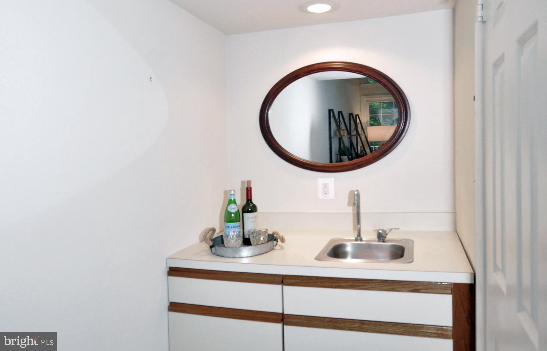 5447 Grove Ridge Way, Unit 115 Rockville, MD 20852 - Photo 36 of 36 Wet Bar in Family room