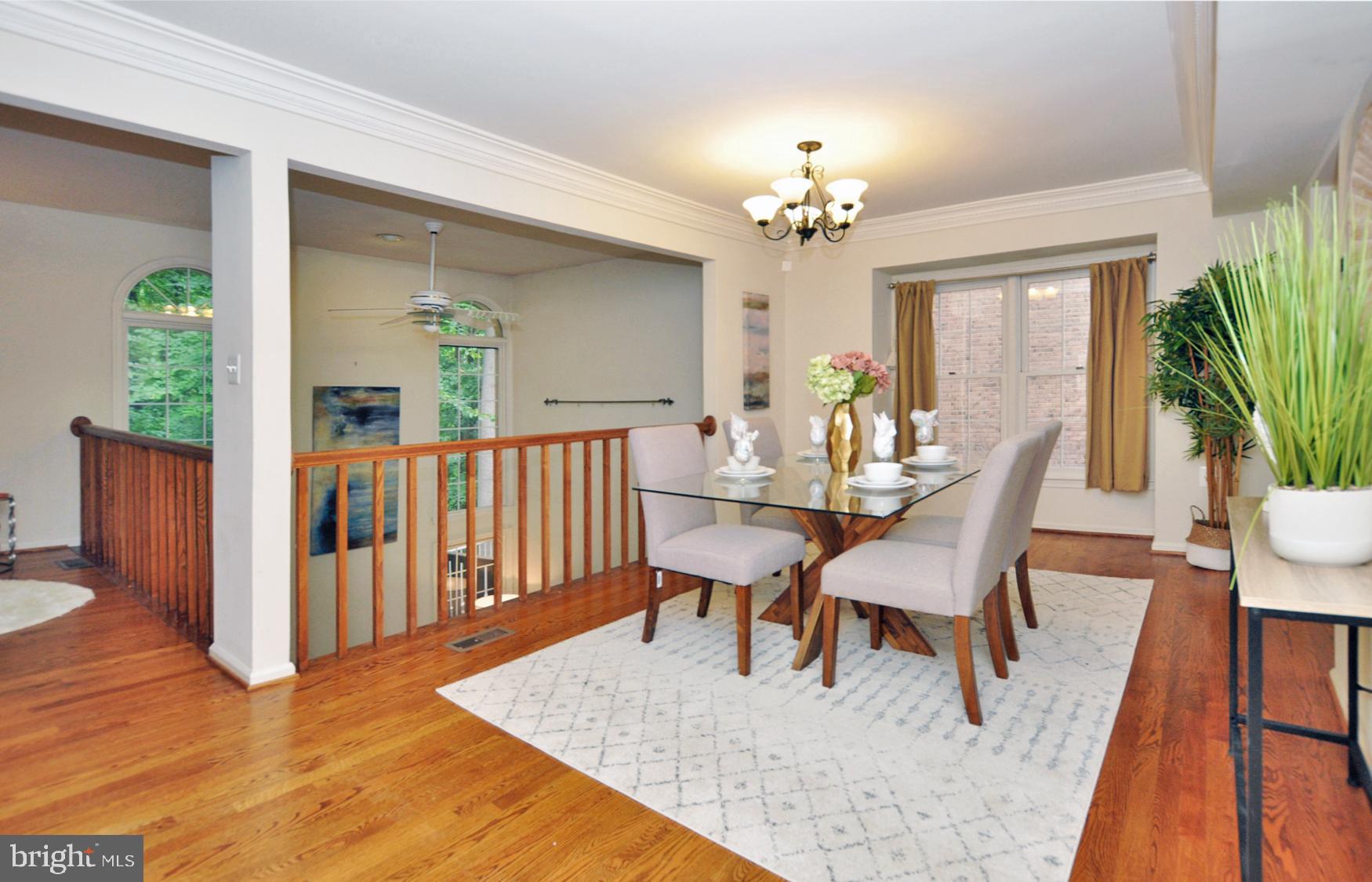 5447 Grove Ridge Way, Unit 115 Rockville, MD 20852 - Photo 8 of 36 Dining room overlooks 2-story Family room