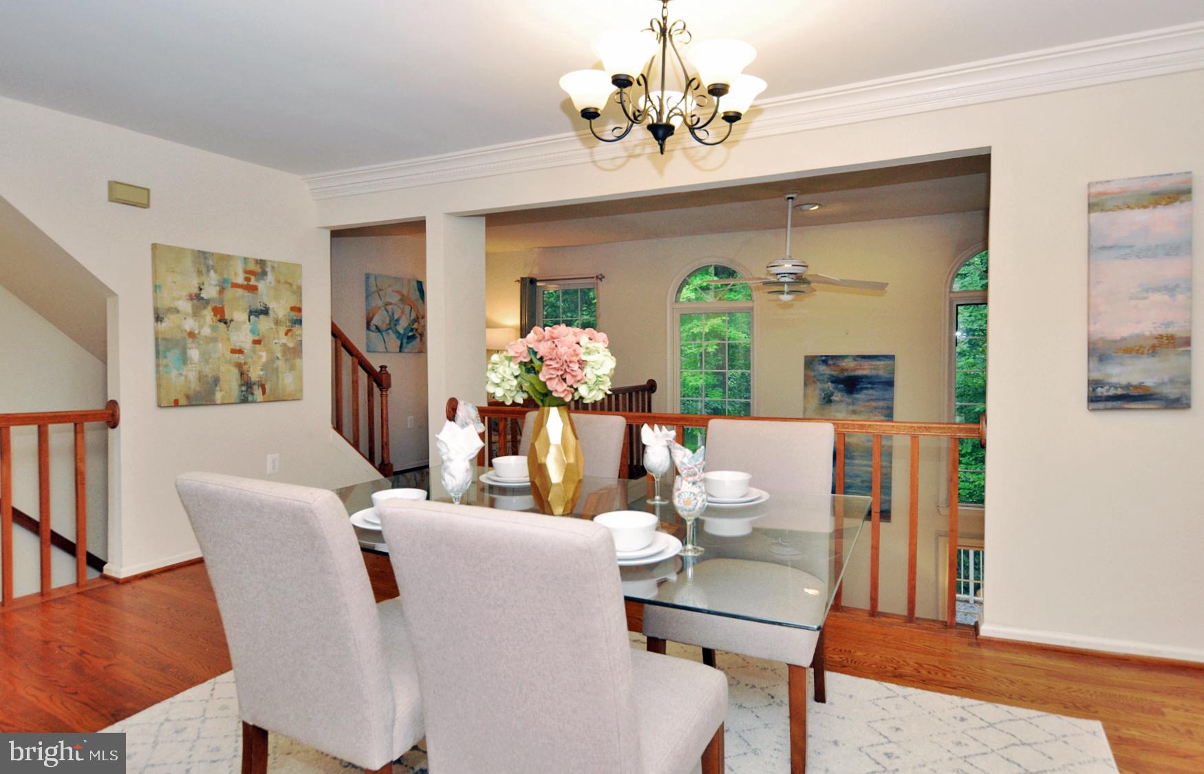 5447 Grove Ridge Way, Unit 115 Rockville, MD 20852 - Photo 10 of 36 Dining room overlooks 2-story Family room