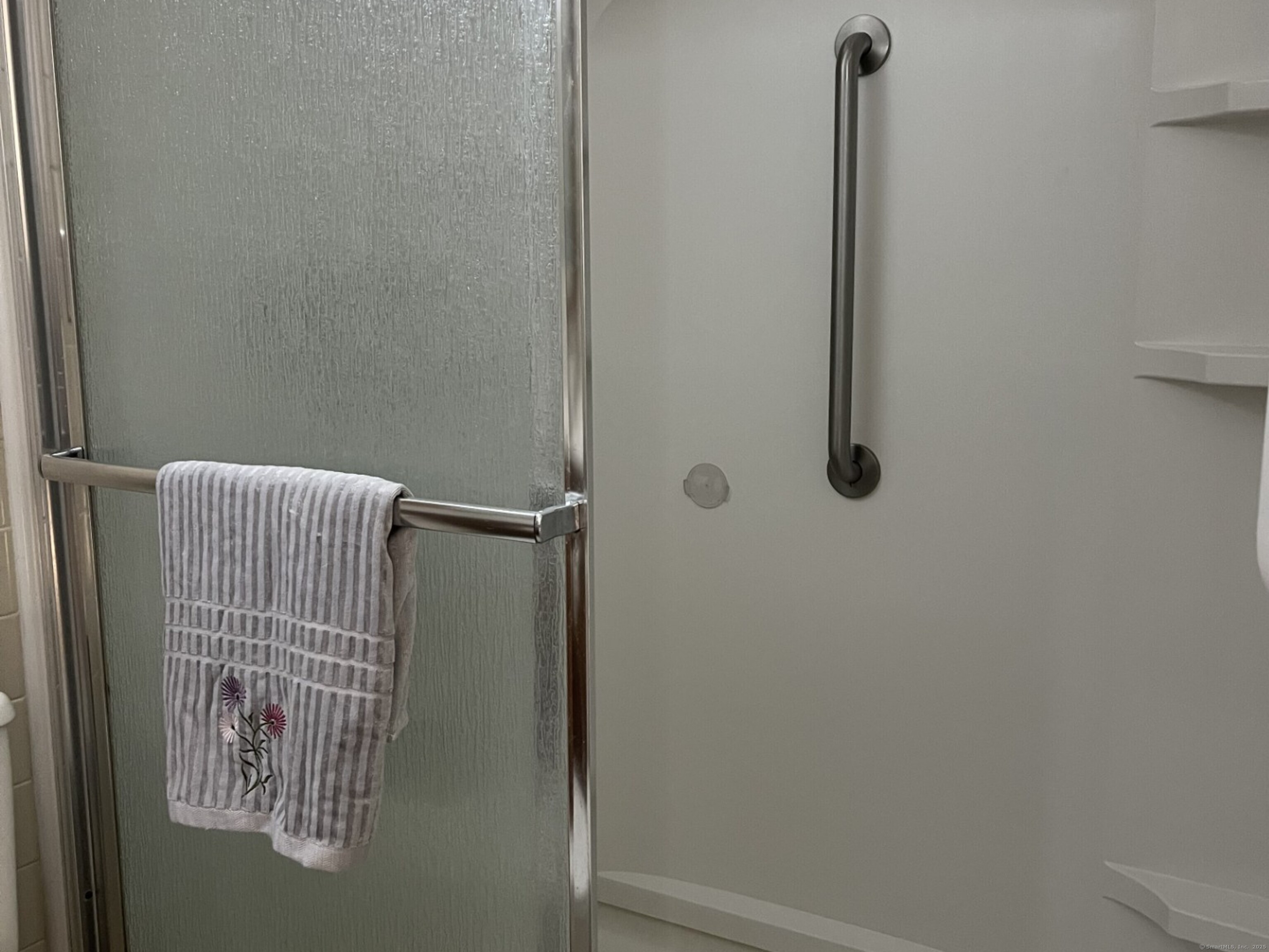 40 Firetown Road, Unit 39 Simsbury, CT 06070 - Photo 24 of 37 WALK-IN SHOWER WITH SAFETY BARS AND BUILT-IN SHELF