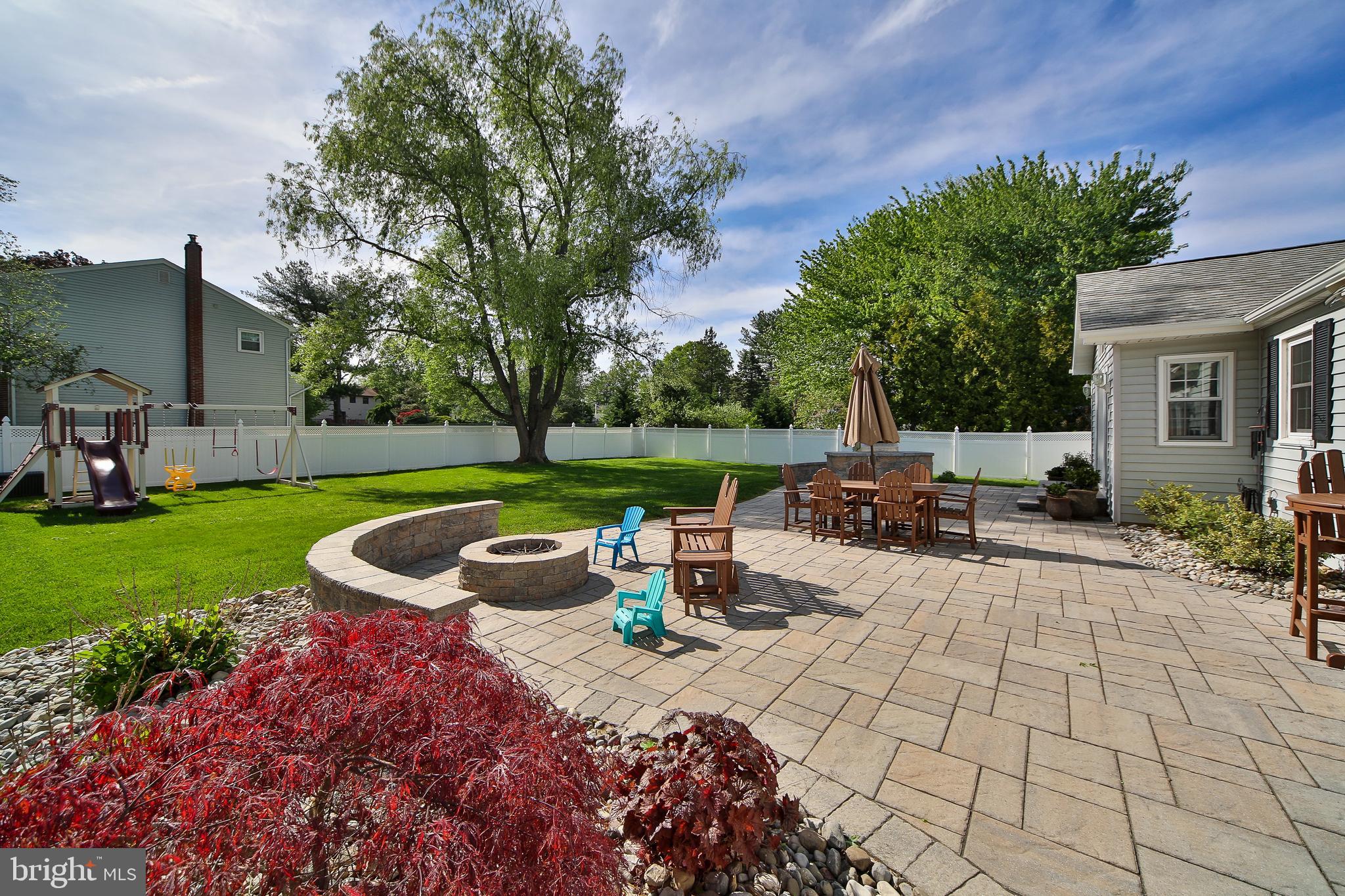 357 Ramsey Road Yardley, PA 19067 - Photo 4 of 35 Paver patio w Firepit