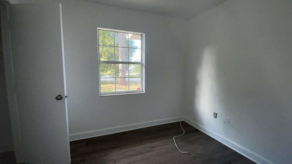 216 Maria Street Fort Myers, FL 33916 - Photo 8 of 19 an empty room with a window