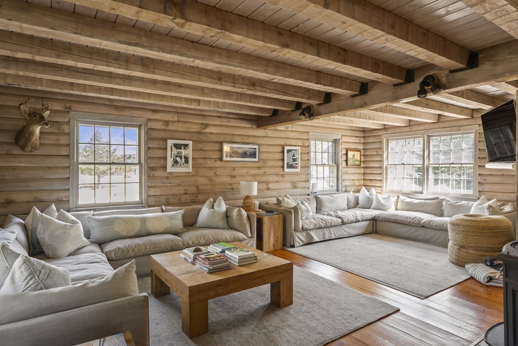 7 Pip'n Road Edgartown, MA 02539 - Photo 3 of 41 a living room with furniture and a large window