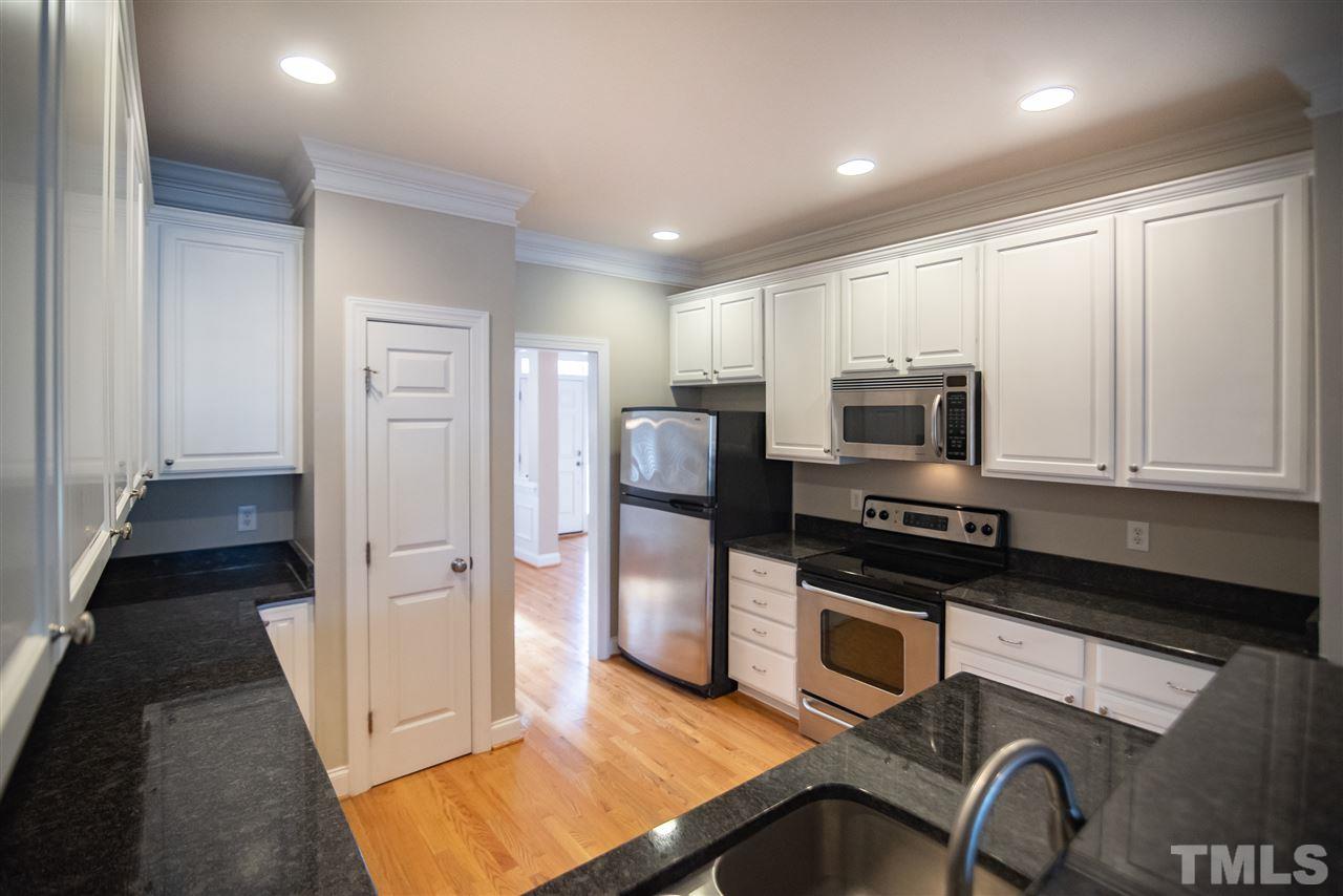 11006 Flower Bed Court Raleigh, NC 27614 - Photo 1 of 24 a kitchen with stainless steel appliances granite countertop a refrigerator and a stove top oven