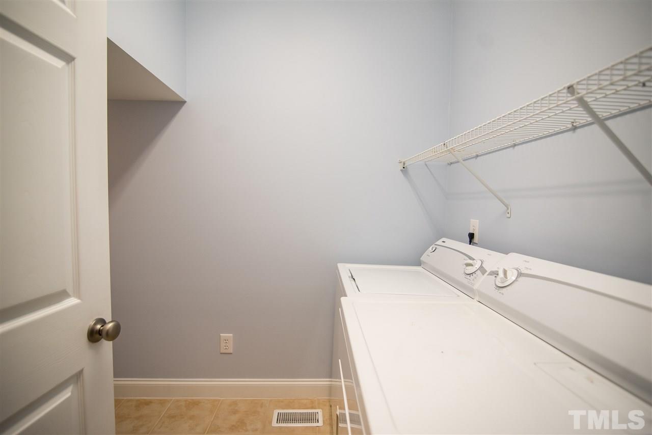 11006 Flower Bed Court Raleigh, NC 27614 - Photo 11 of 24 a utility room with dryer and washer