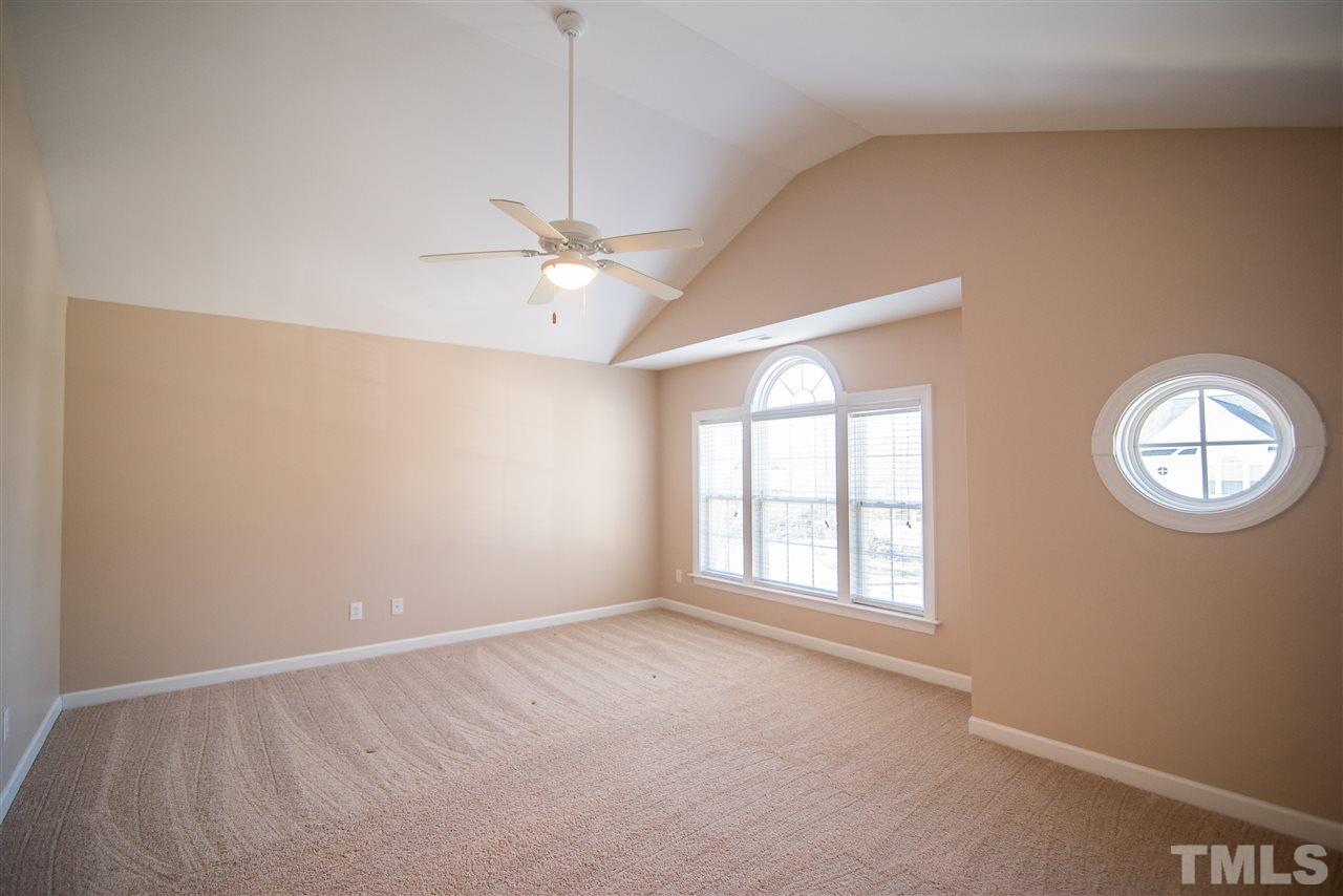 11006 Flower Bed Court Raleigh, NC 27614 - Photo 13 of 24 wooden floor in an empty room with a window