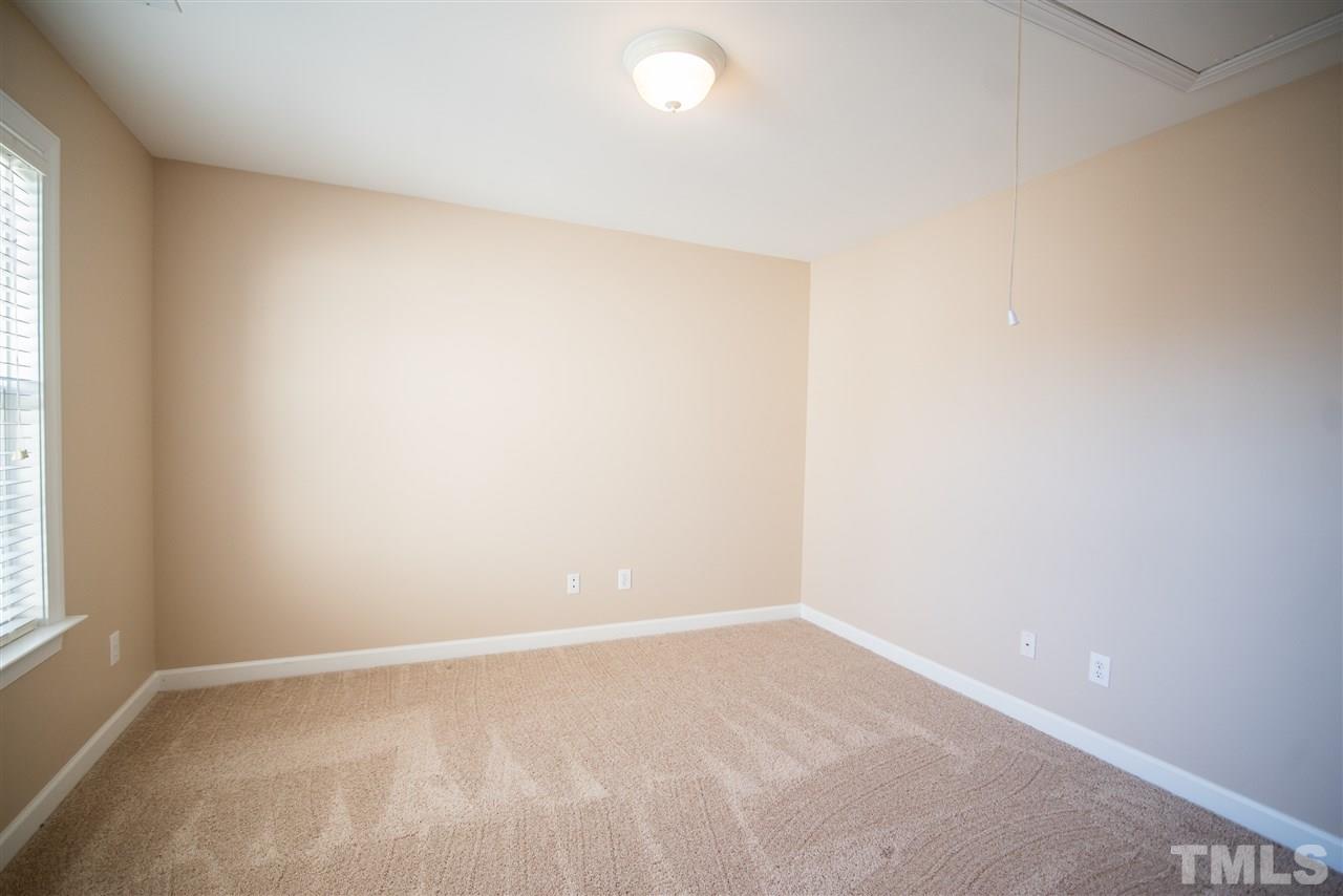 11006 Flower Bed Court Raleigh, NC 27614 - Photo 15 of 24 an empty room with a window