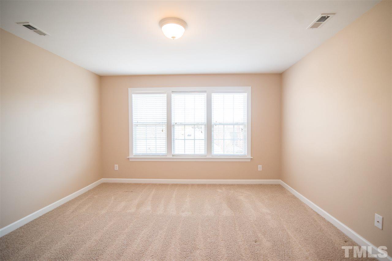 11006 Flower Bed Court Raleigh, NC 27614 - Photo 17 of 24 an empty room with a window