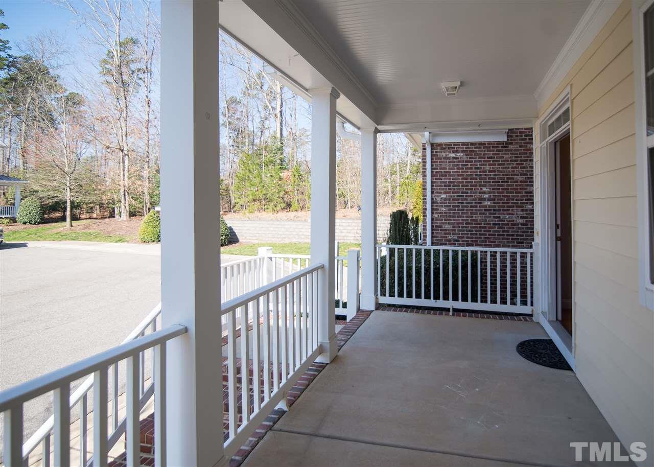 11006 Flower Bed Court Raleigh, NC 27614 - Photo 3 of 24 a view of a room with wooden floor and stairs