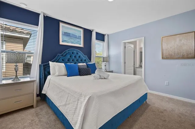 a bathroom with a tub and a sink