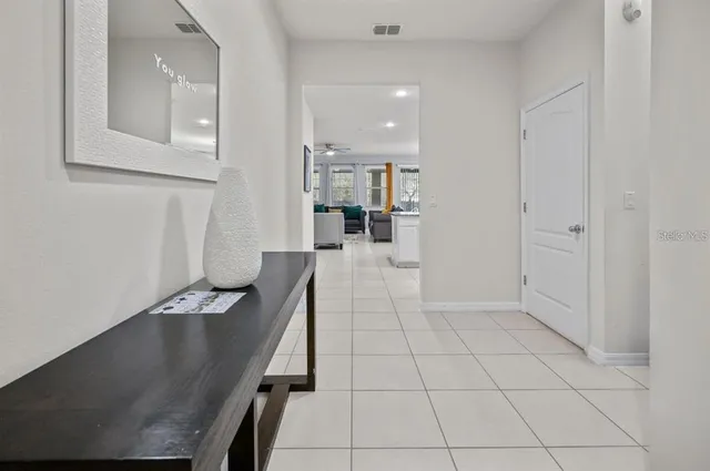 a view of kitchen with furniture and wooden floor