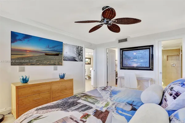 a bedroom with a bed and furniture