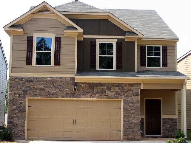 5059 Jack Drive, Unit 72 Decatur, GA 30035 - Photo 1 of 1 a front view of a house with a yard