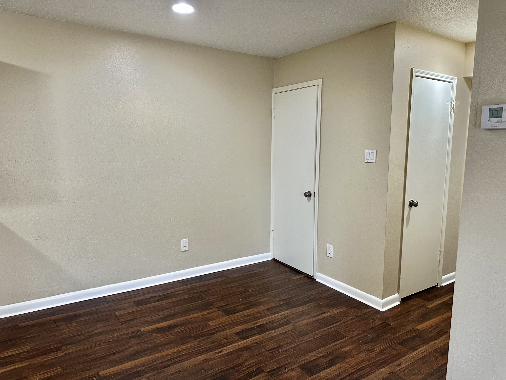 2750 Holly Hall Street, Unit 703 Houston, TX 77054 - Photo 4 of 20 Dining area with door on the right to the utility closet.