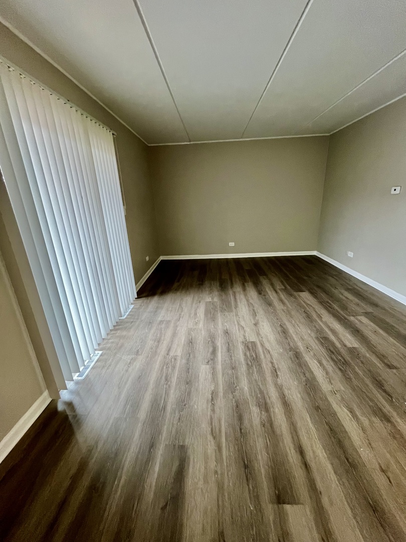 914 School Street, Unit 1 Lisle, IL 60532 - Photo 5 of 8 a view of wooden floor