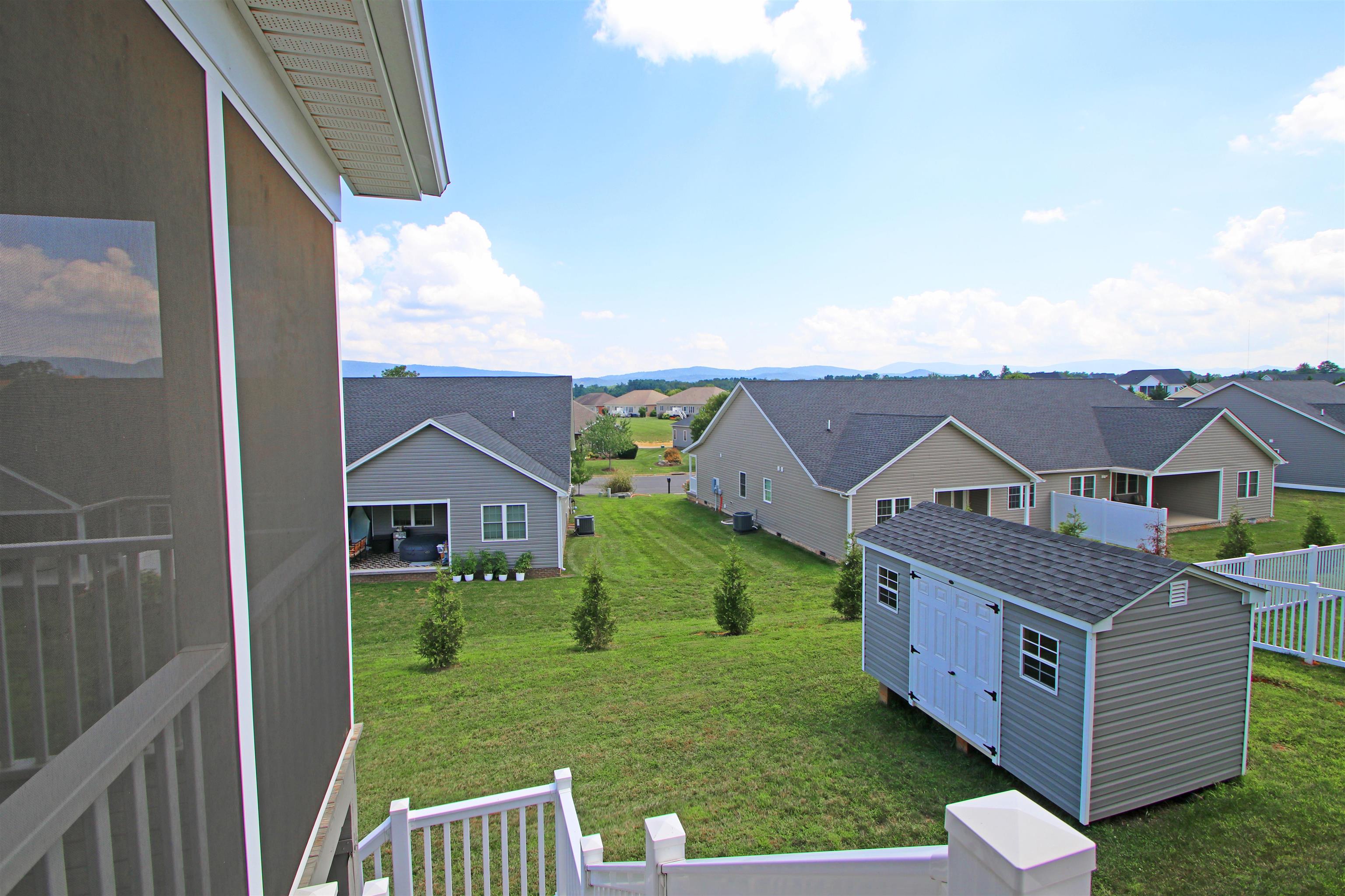 224 Spring Run Lane Waynesboro, VA 22980 - Photo 11 of 52 a view of a house with a big yard potted plants and large tree