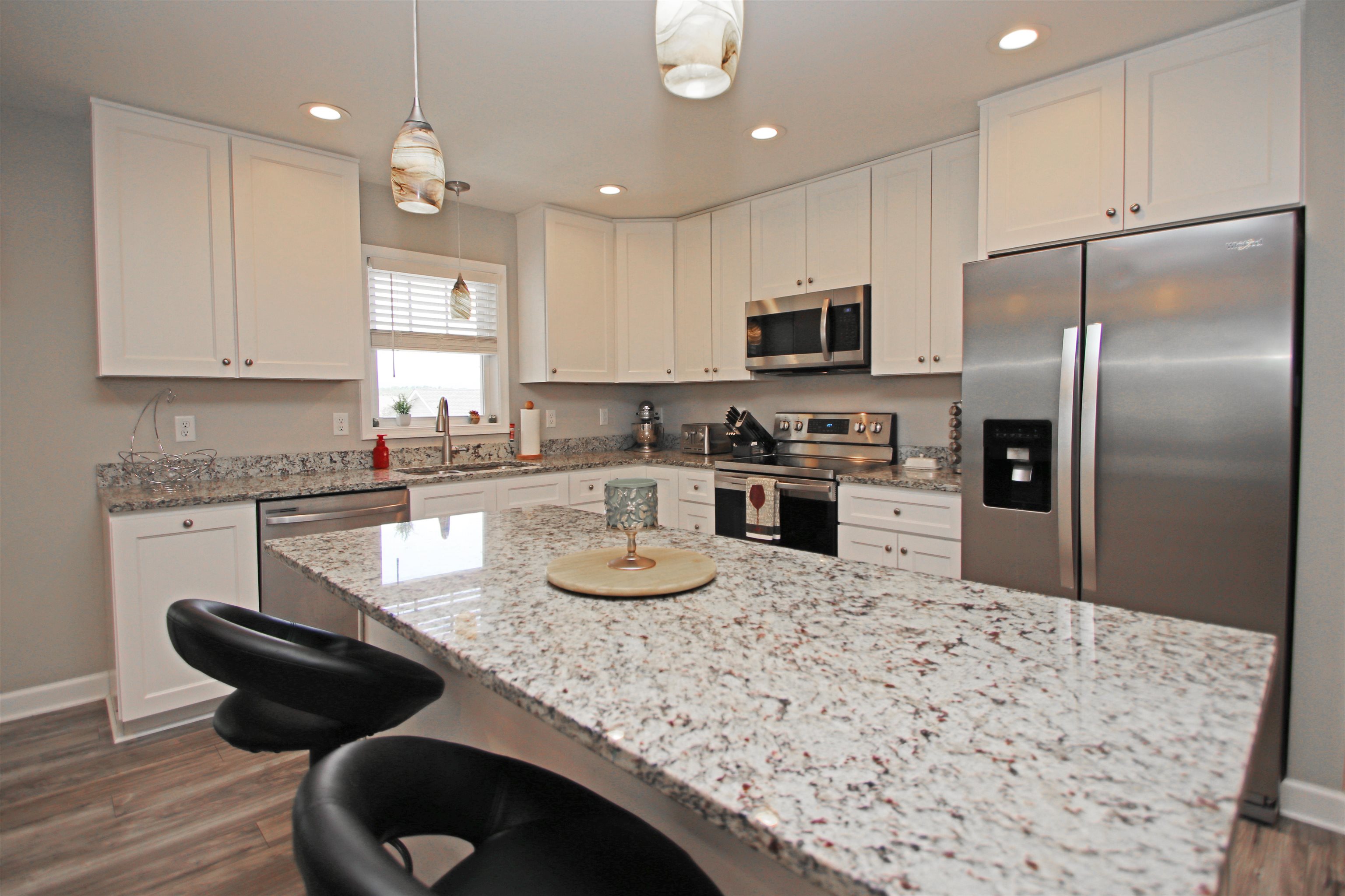 224 Spring Run Lane Waynesboro, VA 22980 - Photo 13 of 52 a kitchen with stainless steel appliances granite countertop a sink refrigerator and microwave