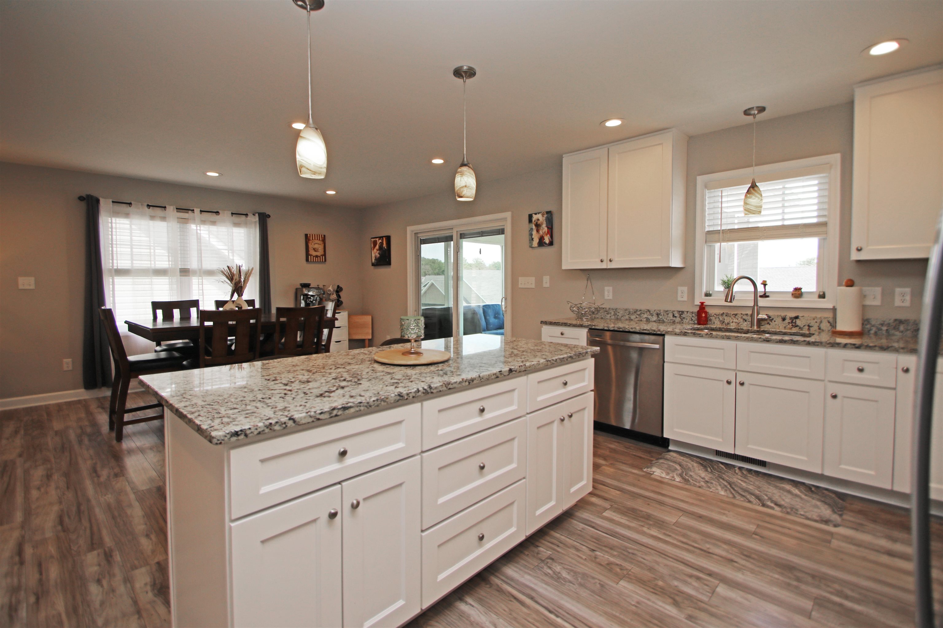 224 Spring Run Lane Waynesboro, VA 22980 - Photo 14 of 52 a kitchen with a stove a sink a center island and a window
