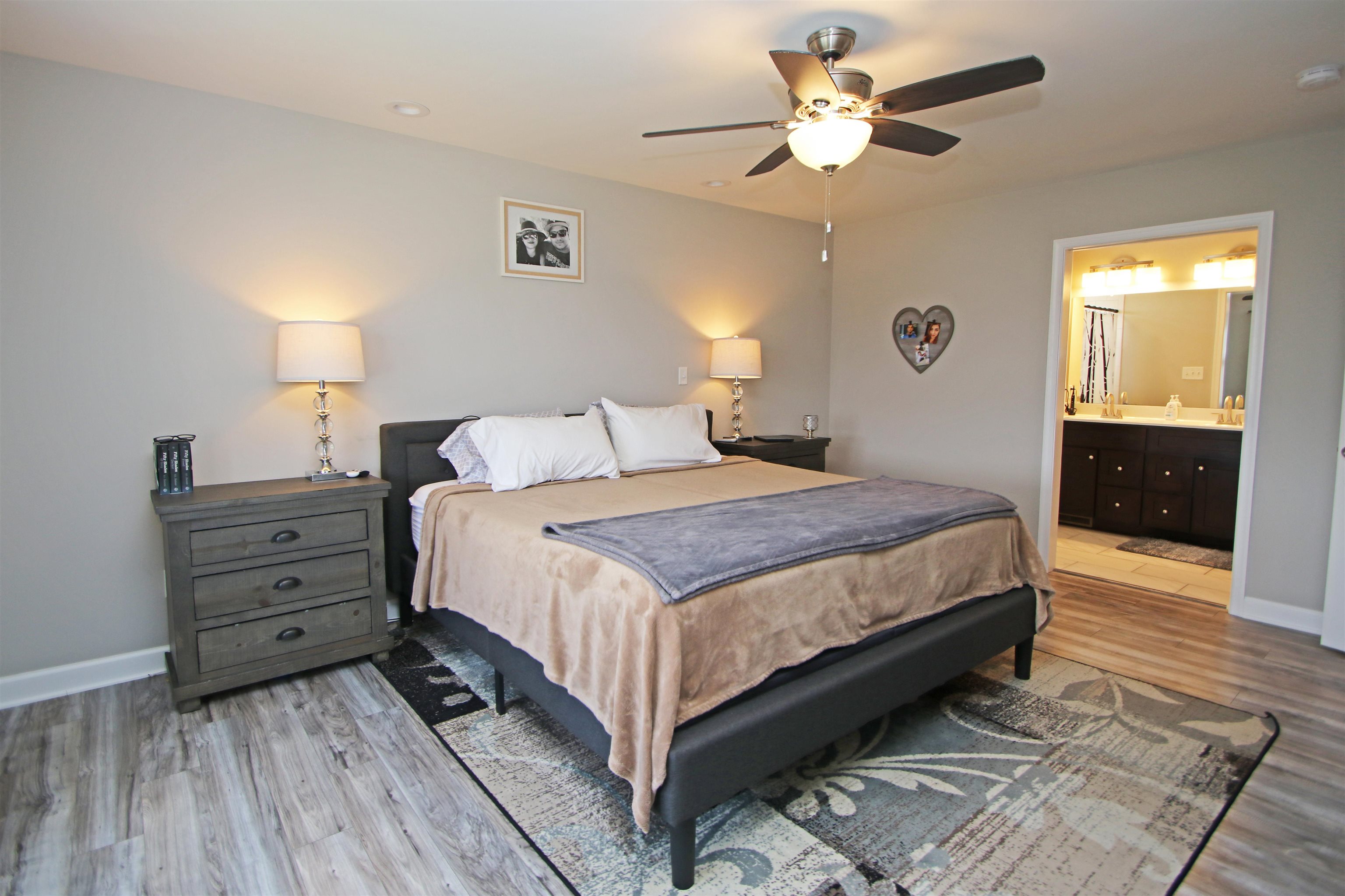 224 Spring Run Lane Waynesboro, VA 22980 - Photo 19 of 52 a bedroom with a bed and a chandelier