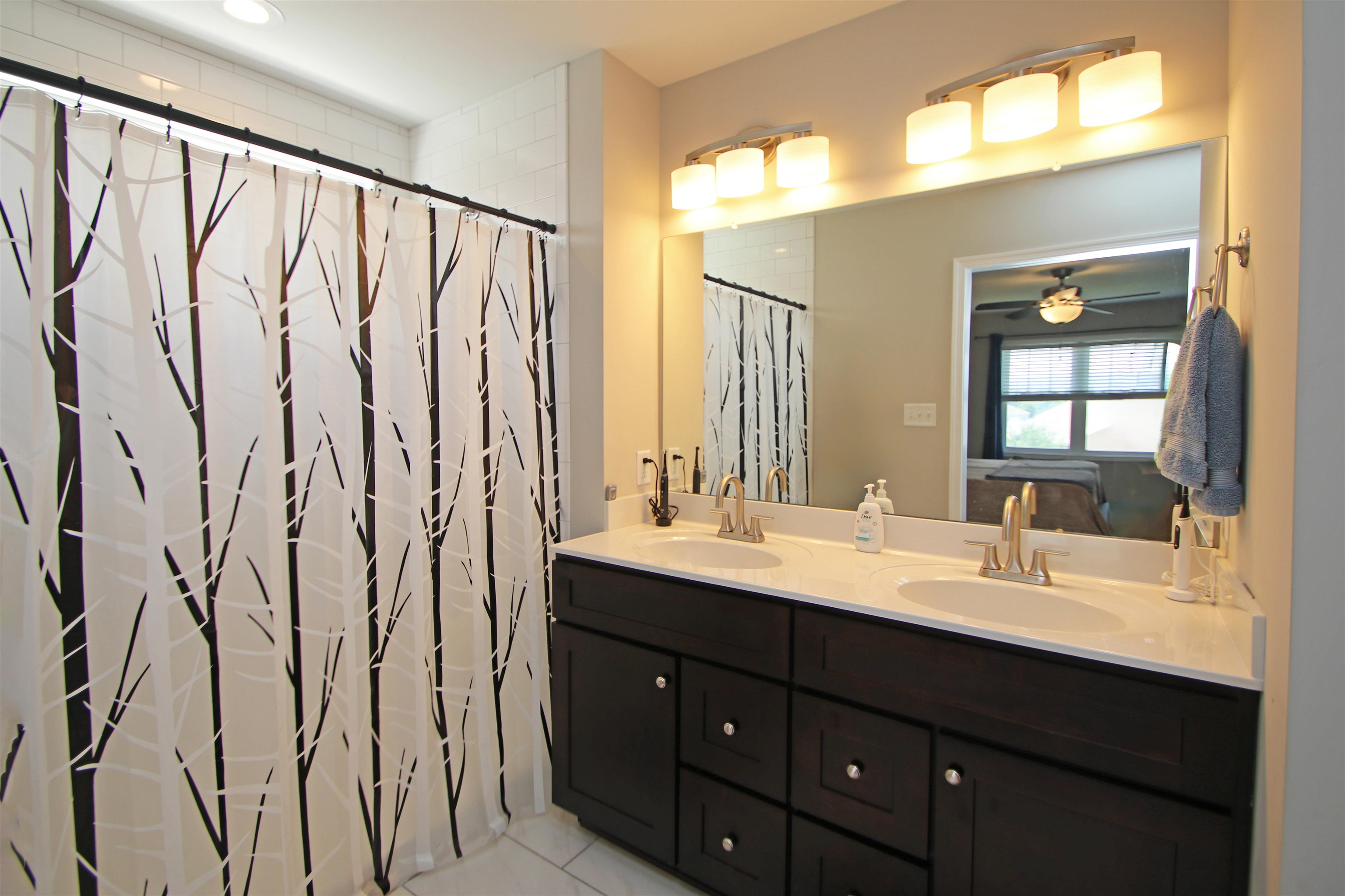 224 Spring Run Lane Waynesboro, VA 22980 - Photo 22 of 52 a bathroom with a double vanity sink and a mirror