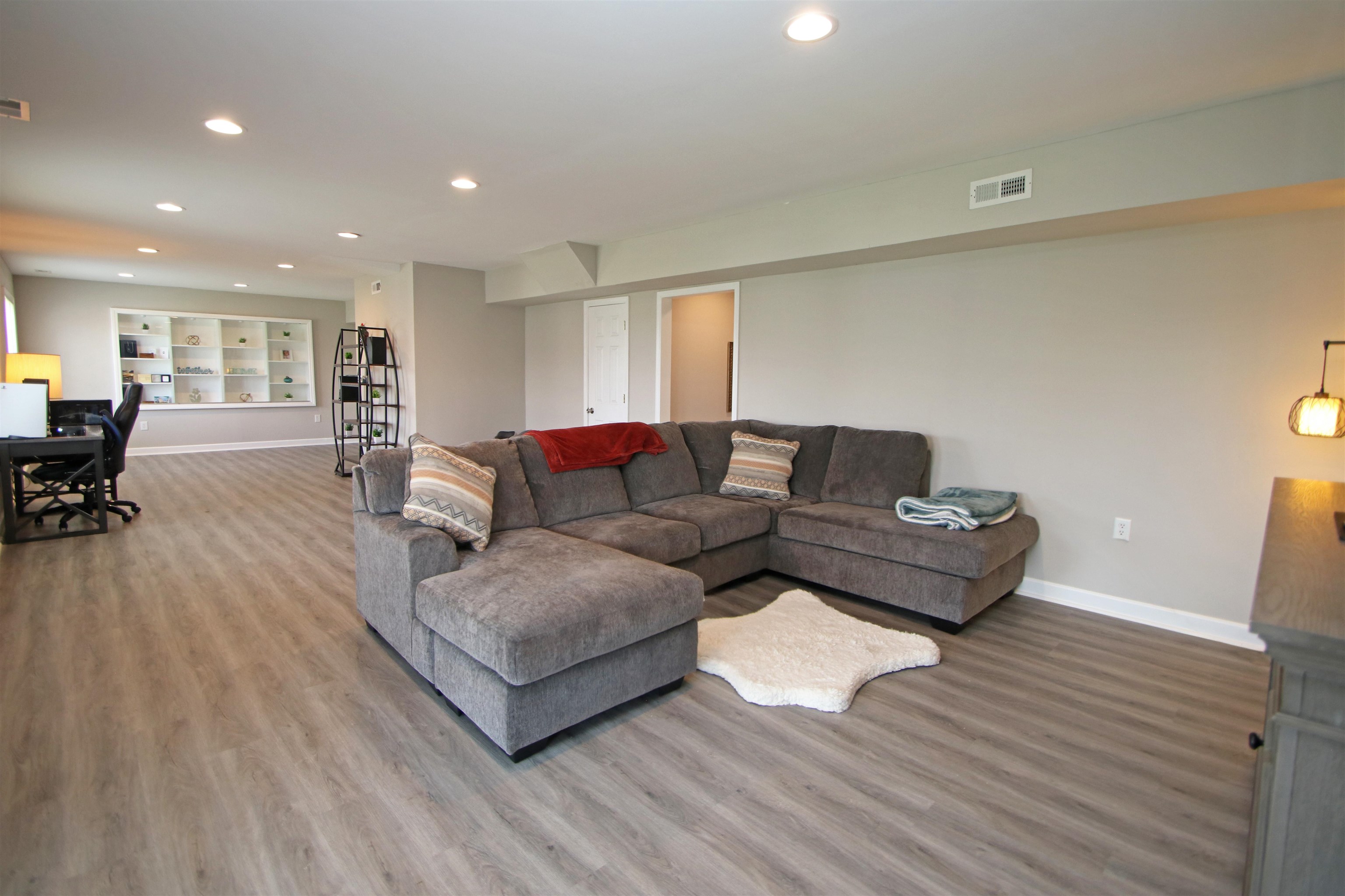 224 Spring Run Lane Waynesboro, VA 22980 - Photo 36 of 52 a living room with furniture and a wooden floor