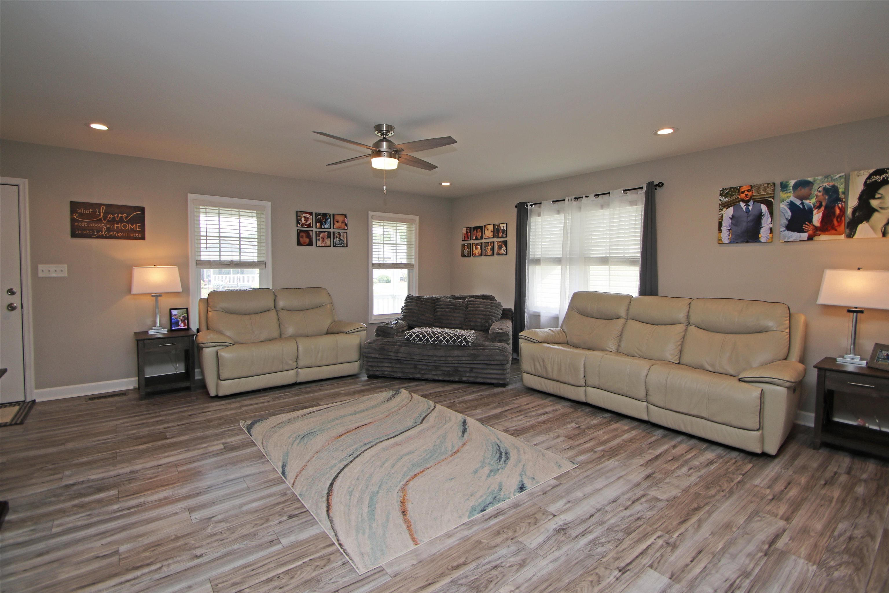 224 Spring Run Lane Waynesboro, VA 22980 - Photo 6 of 52 a spacious bedroom with a bed couches and wooden floor
