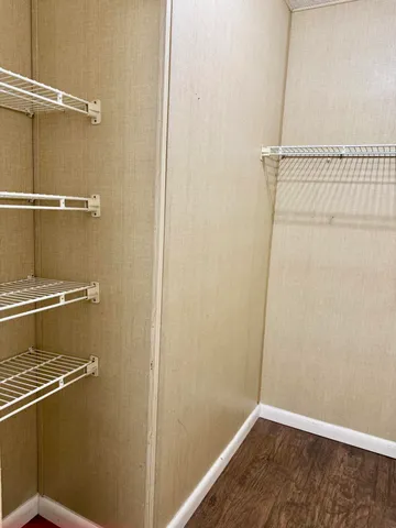 a view of a room with racks on the wall
