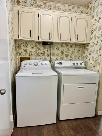 a utility room with dryer and washer