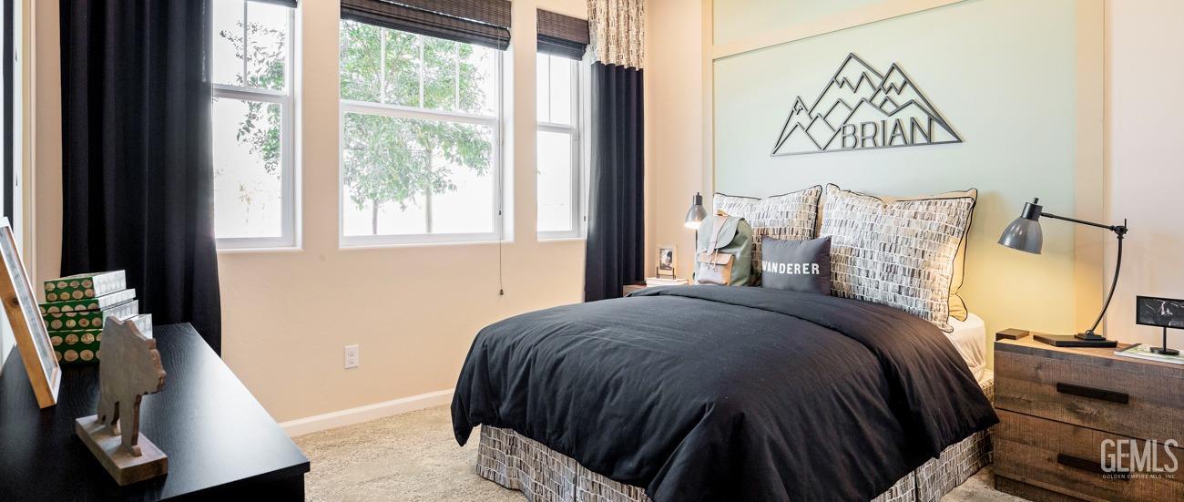 Undisclosed Address Bakersfield, CA 93314 - Photo 15 of 16 a bedroom with a bed and wooden floor