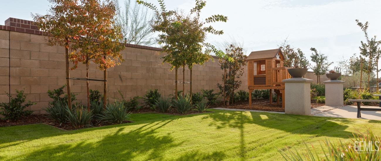 Undisclosed Address Bakersfield, CA 93314 - Photo 16 of 16 a swimming pool with outdoor seating and yard