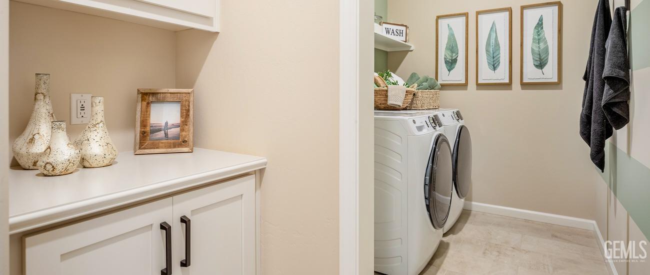 Undisclosed Address Bakersfield, CA 93314 - Photo 2 of 16 a utility room with a sink and mirror