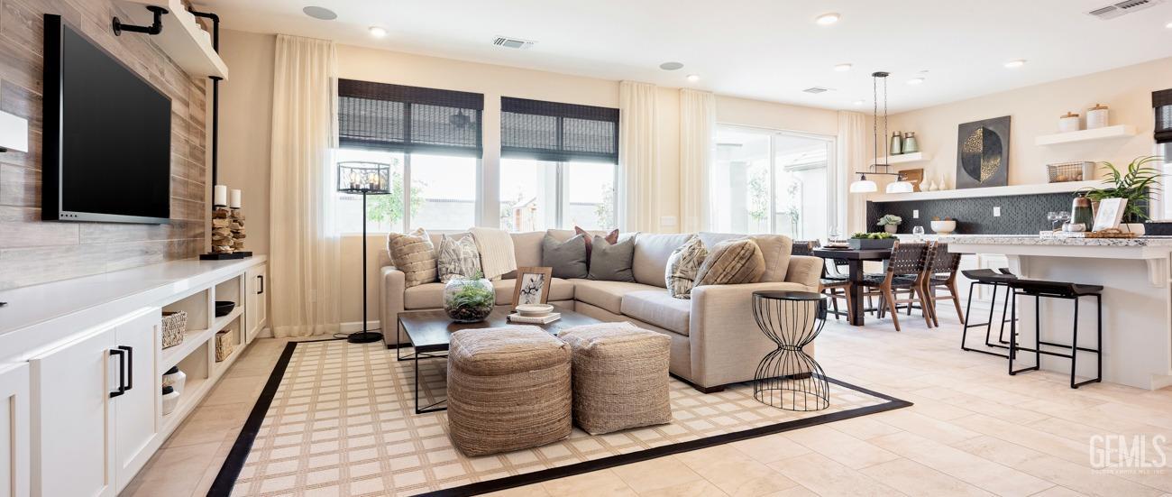 Undisclosed Address Bakersfield, CA 93314 - Photo 4 of 16 a living room with furniture and a large window
