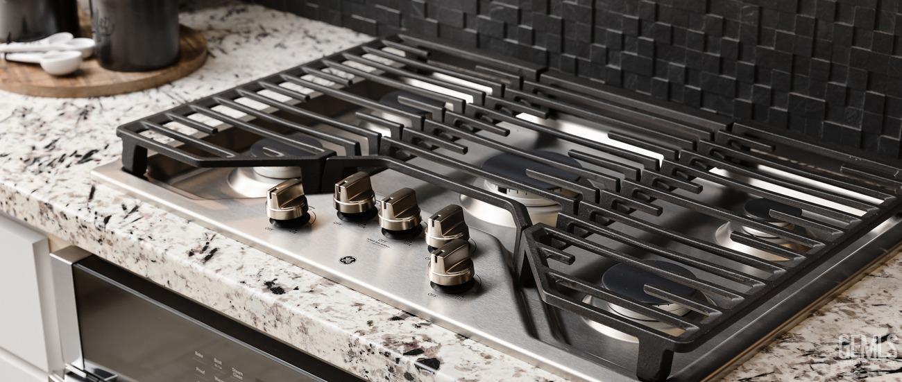 Undisclosed Address Bakersfield, CA 93314 - Photo 7 of 16 a close up of a stove top oven