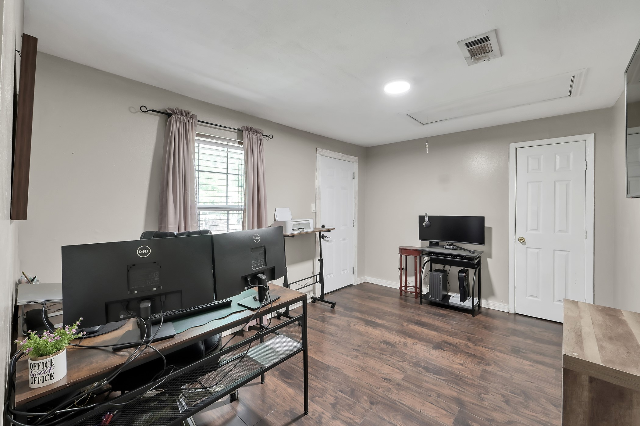 24193 Parker Road Porter, TX 77365 - Photo 13 of 15 a living room with furniture and a flat screen tv