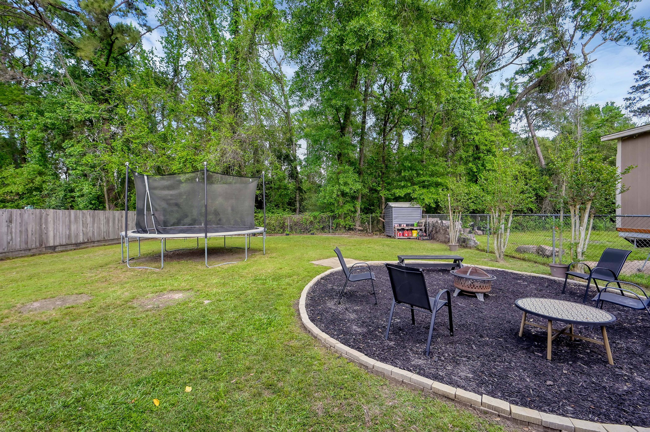 24193 Parker Road Porter, TX 77365 - Photo 14 of 15 a view of a backyard with swimming pool